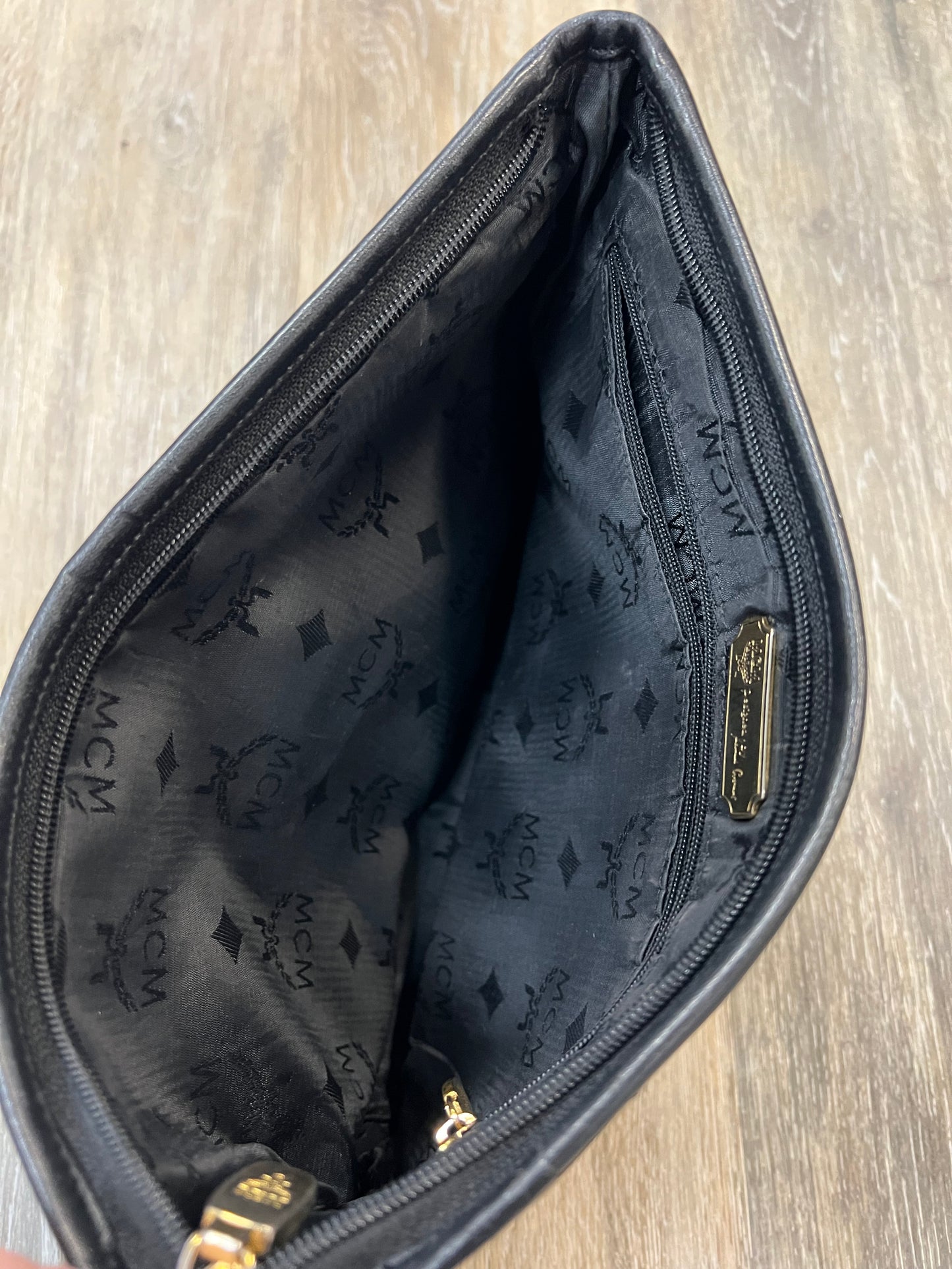 Clutch Luxury Designer By Mcm, Size: Medium